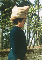 woman carrying potatoes